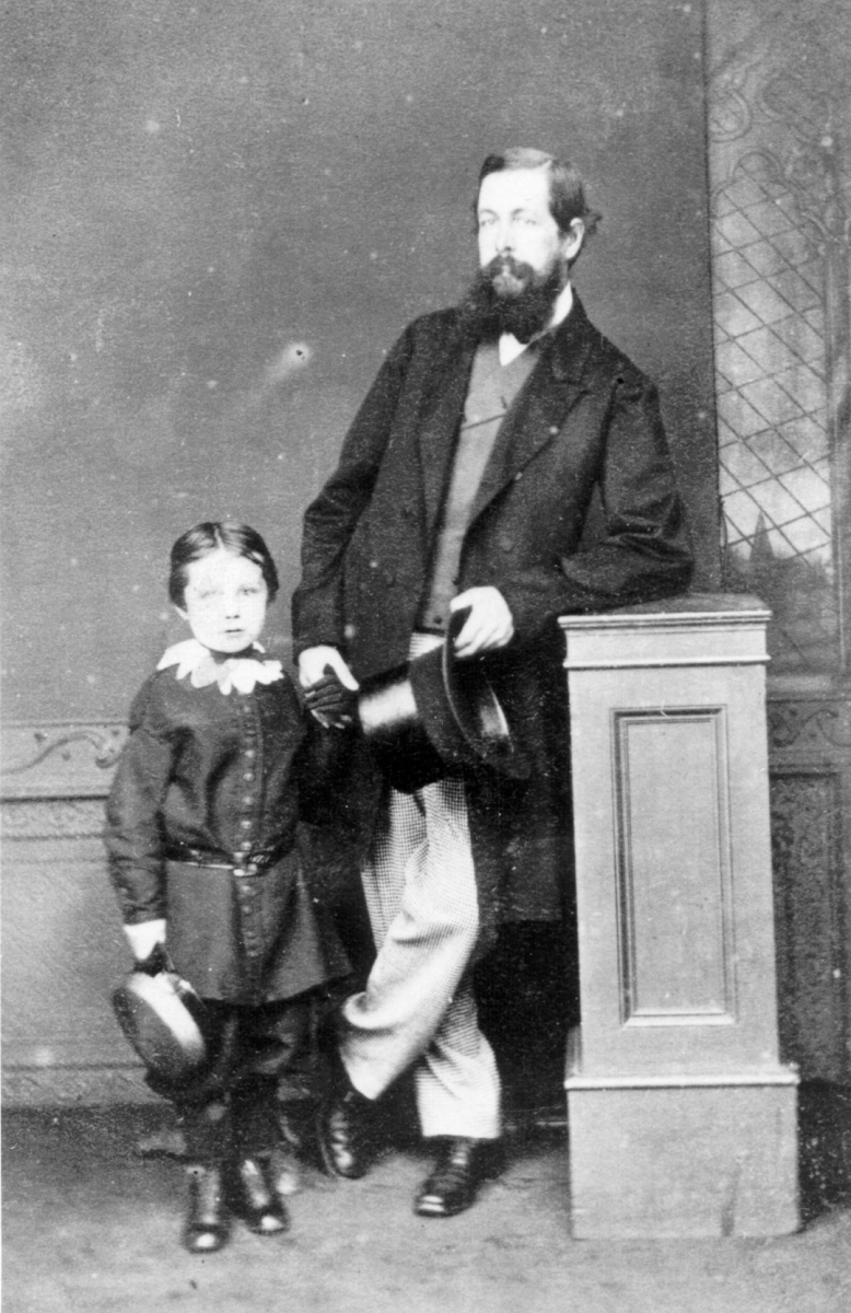 A photograph of a young Conan Doyle with his father